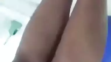 Beautiful desi girl lifting top to reveal sexy boobs