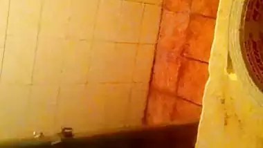 Girl spying on her stepmom having nude bath