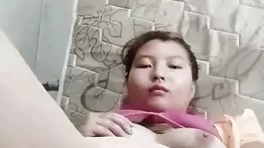 Nepali girl masturbating using big cucumber