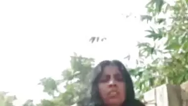 Nude desi Bhabhi bathing outdoors and enjoys video call sex